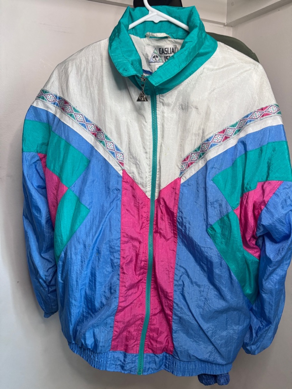 Two Retro wind breaker jackets